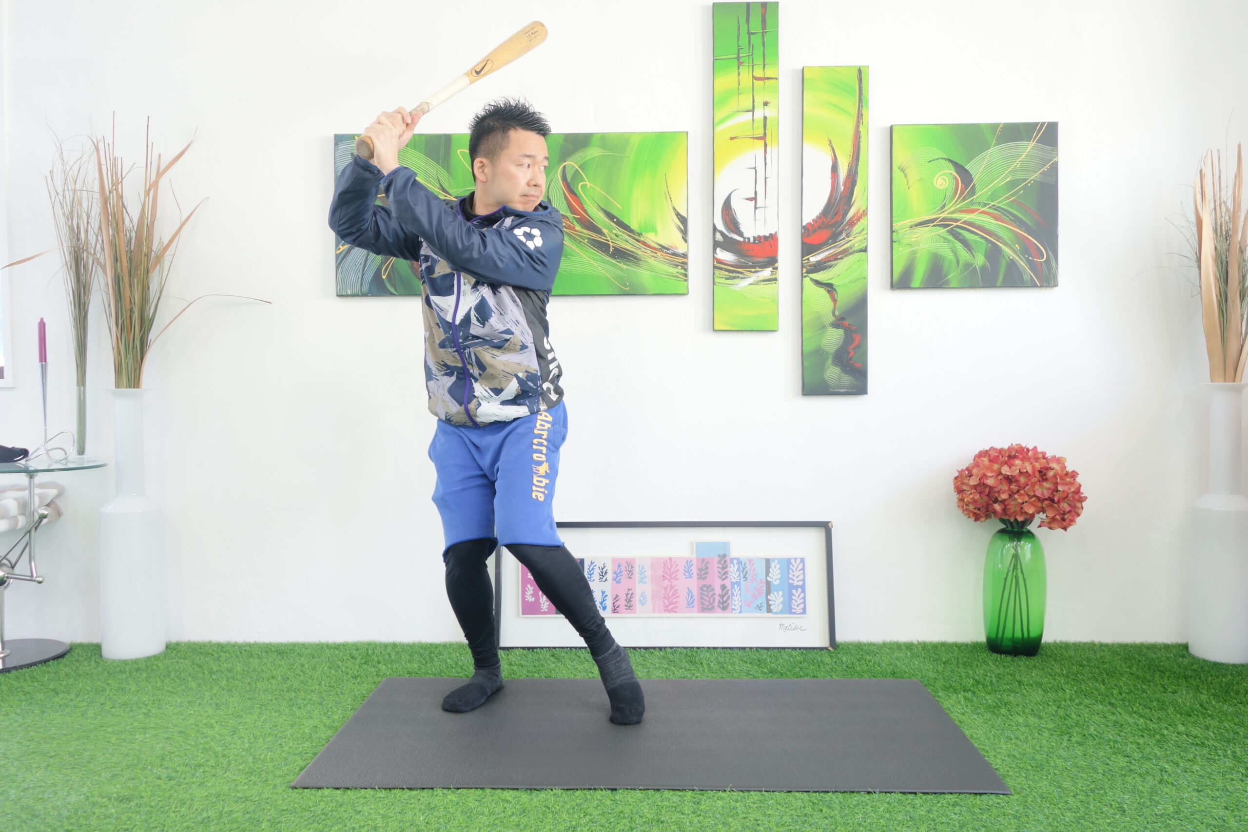 軸足に体重を乗せる