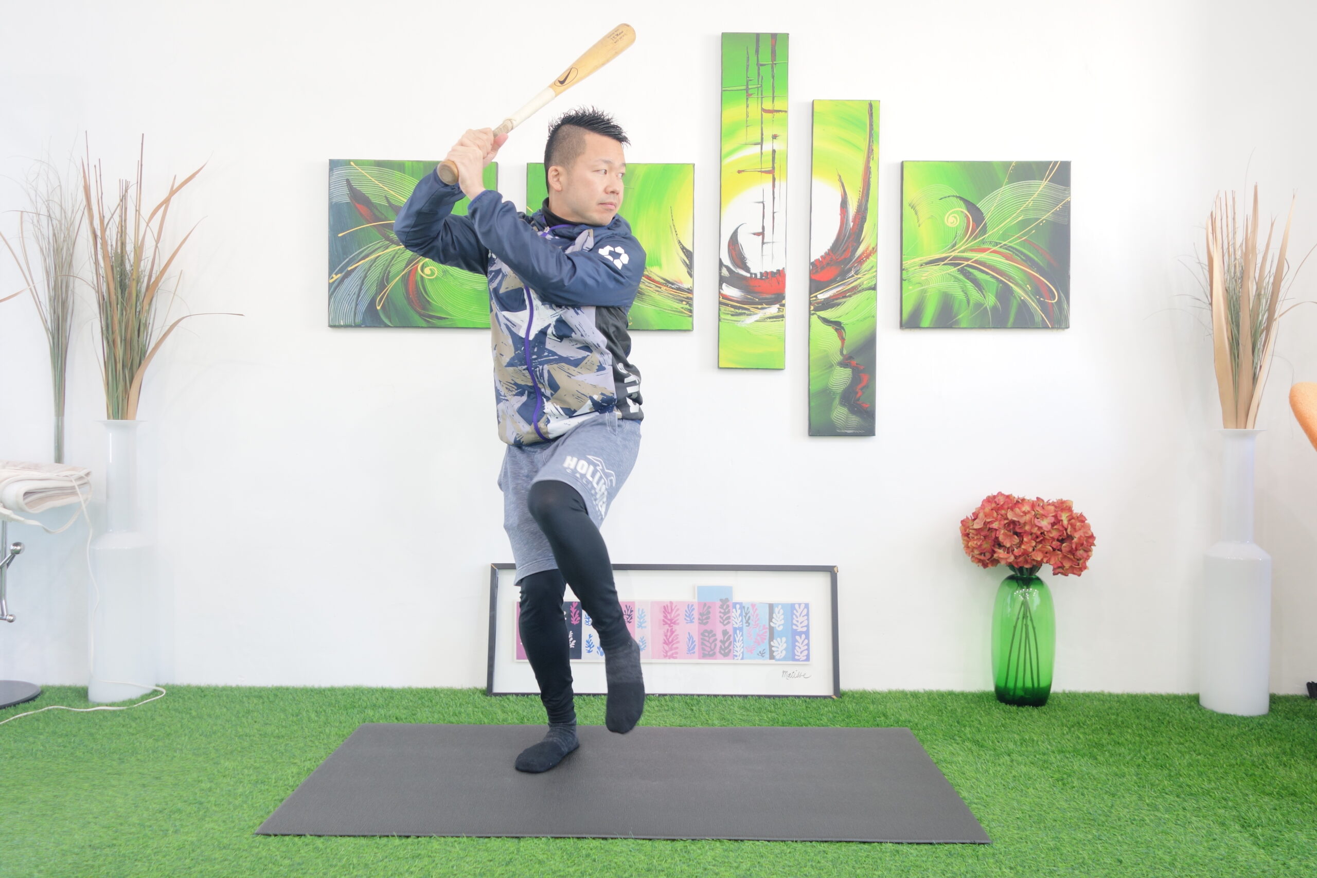 投手が軸足で立つ