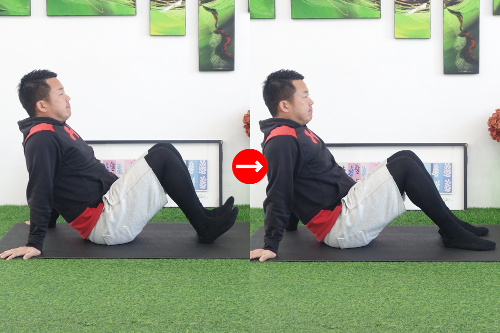 座った状態で両手は体の後ろ。つま先を上げて一気に落とす